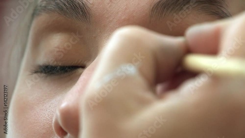 Pink Eye make-up Stock Footage. Model: Mary