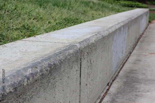 Waxed concrete bench corner for skateboarding