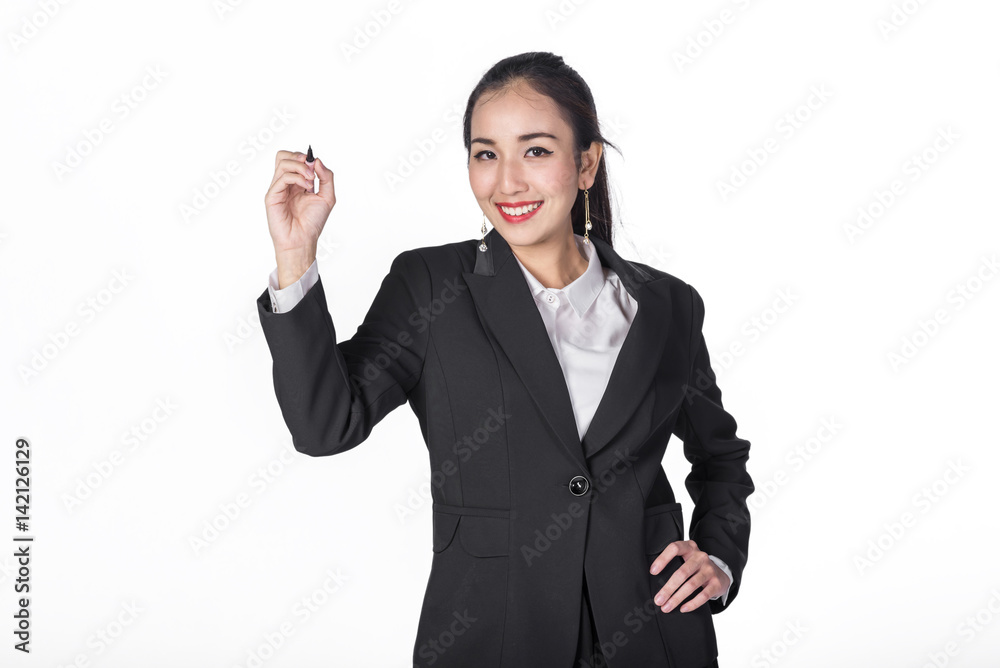 Beautiful young Asian businesswoman holding a pen to write something isolated on white. Image with clipping path. Beautiful young Asian businesswoman holding a pen to write something isolated on white. Image with clipping path.