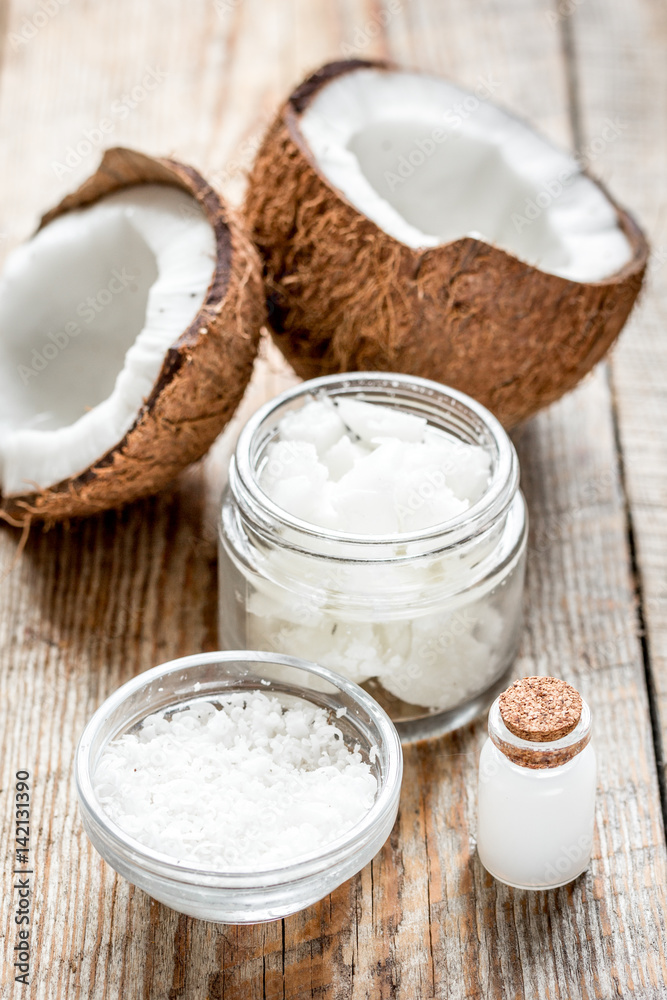 cosmetic concept with fresh coconuts on old wooden table background cosmetic concept with fresh coconuts on old wooden table background