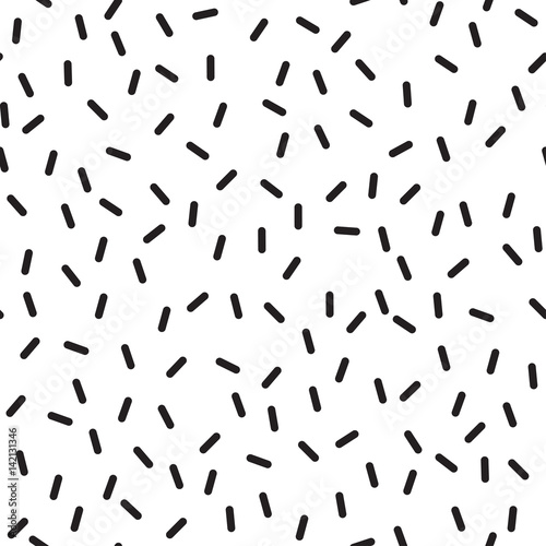 Seamless abstract painted ink pattern. Vector. Rare dashed. Black and white. Trendy ink. The texture of the wrapper or background.