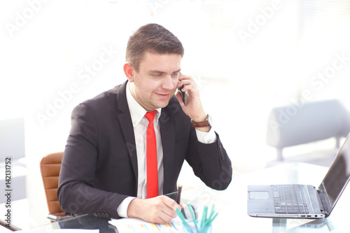 Close up of a man using mobile smart phone