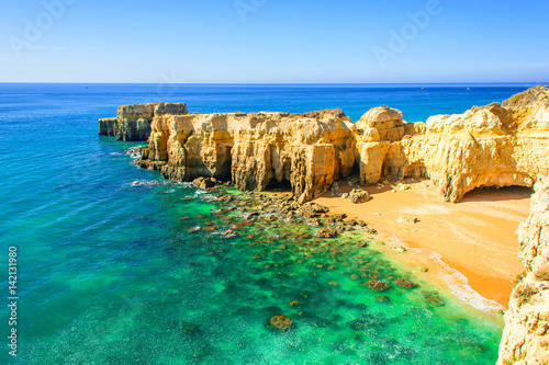 beautiful sea view with secret sandy beach near Albufeira in Algarve, Portugal photo