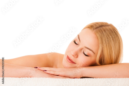 skin care - beautiful young woman nurturing her skin isolated over white background