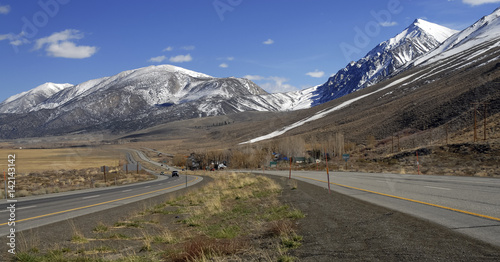 Alpine scene with snow capped mountains in the Eastern Sierra near Yosemite National park, Sierra Nevada Mountains, California a popular place for RV trips, family vacations, backpacking and hiking