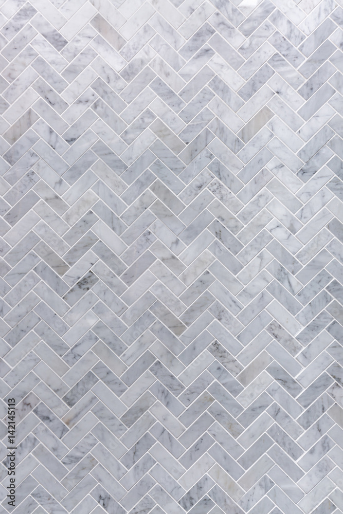 Background of grey and white marble tile in herringbone pattern - obrazy, fototapety, plakaty 