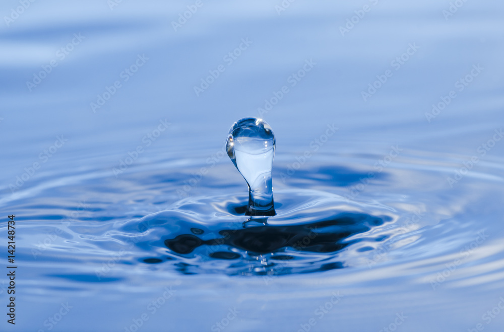 water splash in blue background water splash in blue background