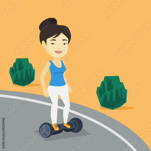 Woman riding on self-balancing electric scooter.