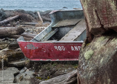 Fishing boat on the rocks