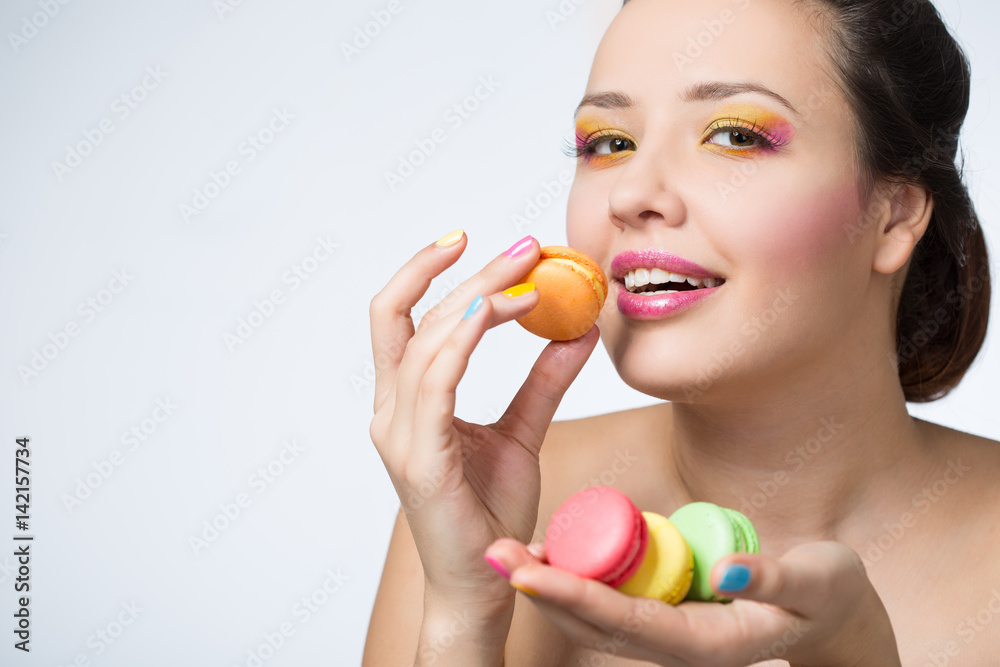 Young woman with makarons Young woman with makarons