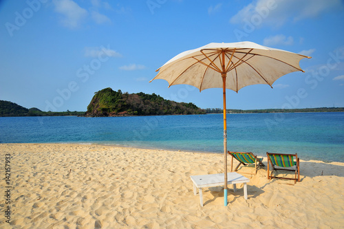 Fototapeta Naklejka Na Ścianę i Meble -  Beach Chairs on Summer Beach