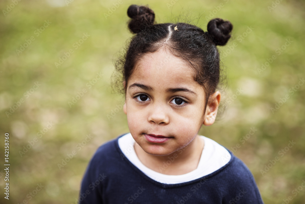 Outdoor portrait of a cute young black girl Outdoor portrait of a cute young black girl
