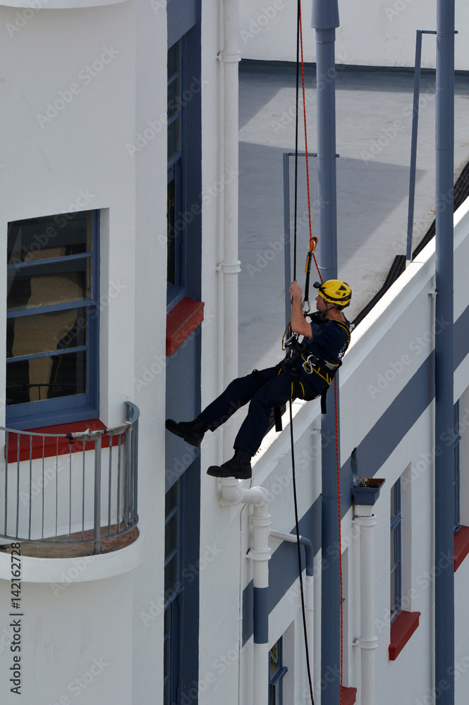 Fototapeta premium Firefighter during abseiling exercise