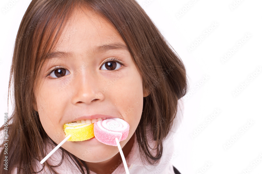 cute little girl playing, eating sugar jelly sweet candy cute little girl playing, eating sugar jelly sweet candy