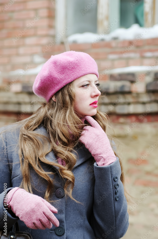 Girl in gray coat and pink beret / The picture was taken in Russia, in the city of Orenburg, on Kobozev Street. Girl in gray coat and pink beret / The picture was taken in Russia, in the city of Orenburg, on Kobozev Street.