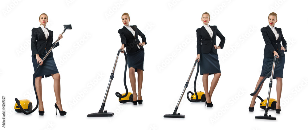 Businesswoman cleaning with vacuum cleaner on white