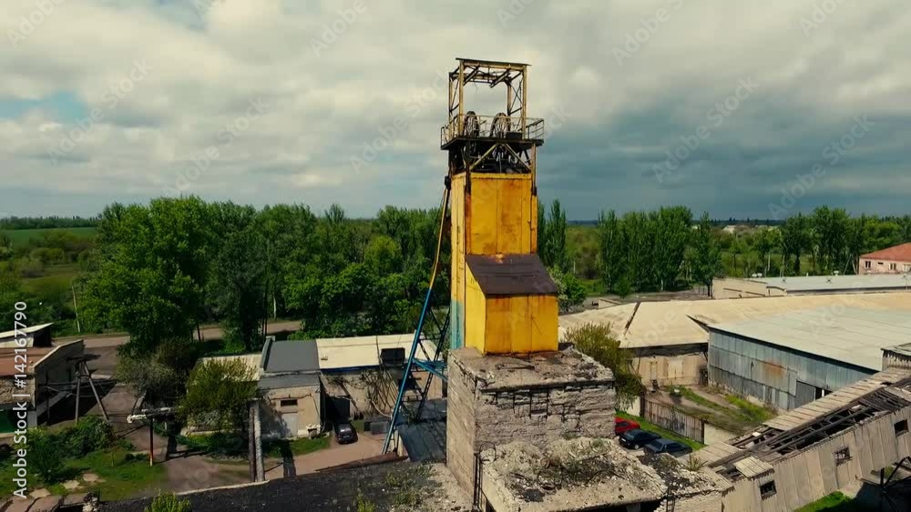 Ruined coal mine. The copter flies over the territory of the old destroyed mine. Ruined coal mine. The copter flies over the territory of the old destroyed mine.