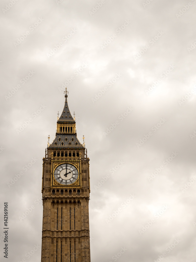 Big Ben at 2 O'Clock. The iconic London landmark, Big Ben, at 2pm on a grey overcast day; with space for copy.