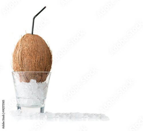 Cocktail in coconut. Copyspace, isolated on white background