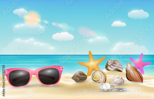 pink sunglasses sea shell and starfish on a sea sand beach