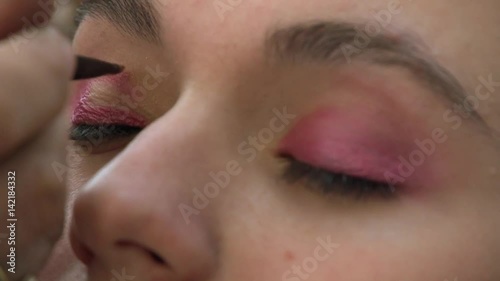 Pink Eye make-up Stock Footage. Model: Mary