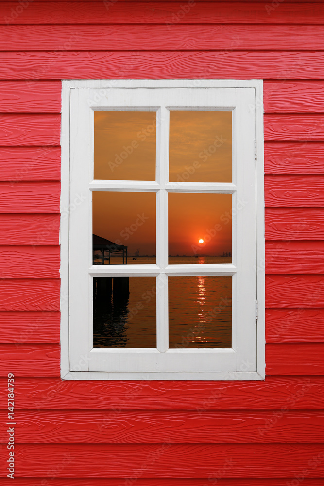 White window looking out to see view.