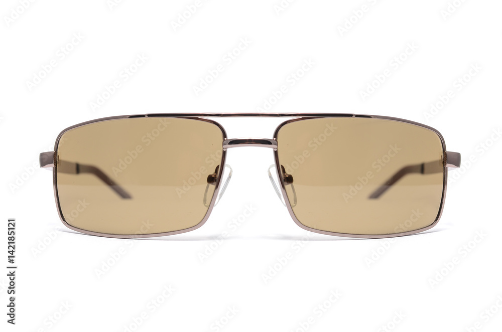 Men's sunglasses with brown glasses in metal frame isolated on white Men's sunglasses with brown glasses in metal frame isolated on white