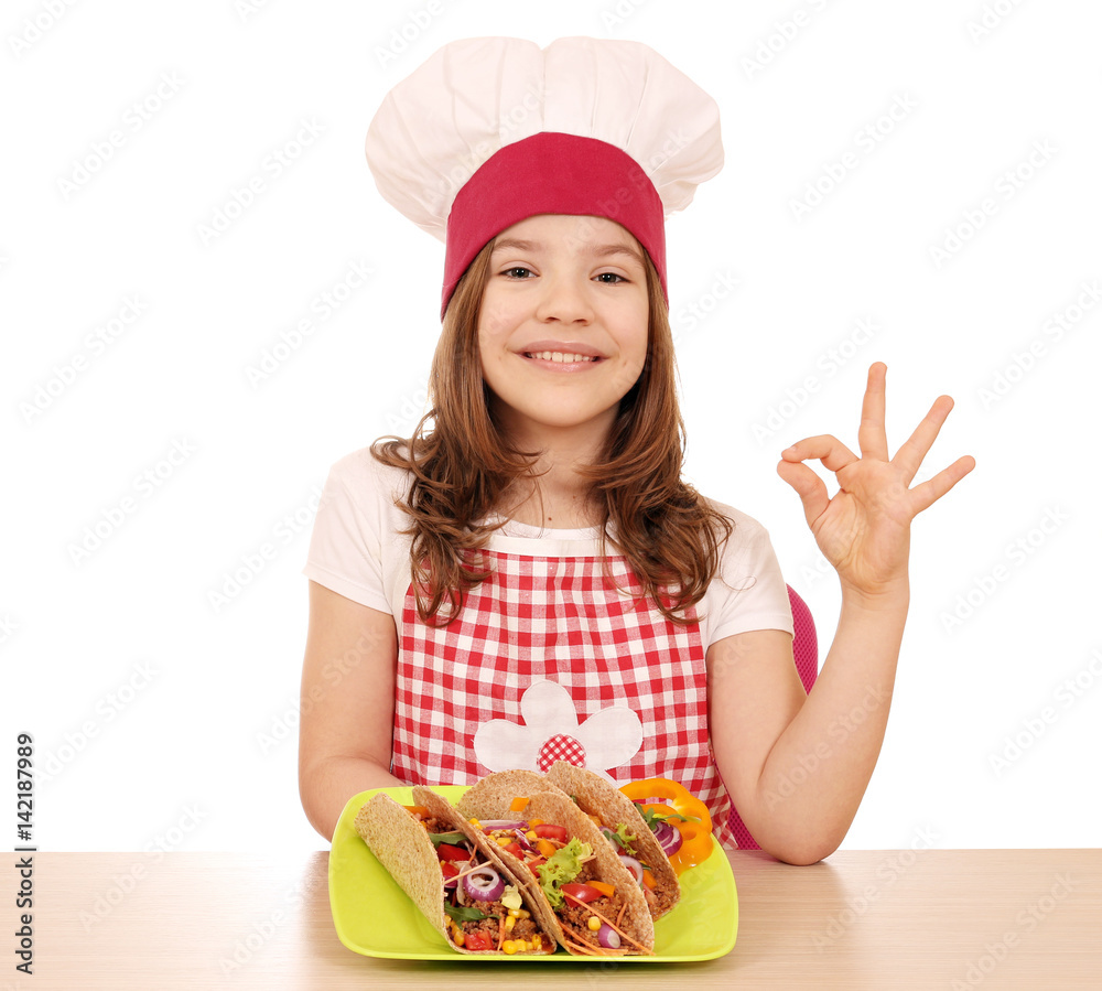 happy little girl cook with tacos and ok hand sign happy little girl cook with tacos and ok hand sign