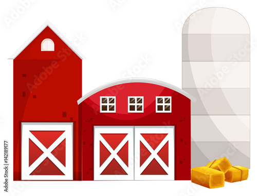 Silo and two red buildings