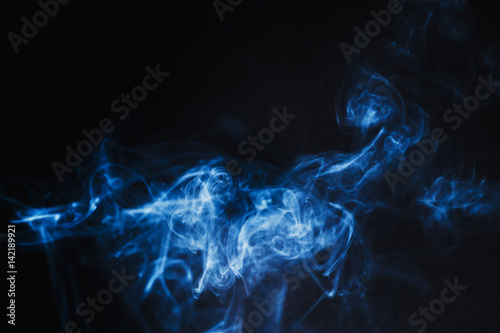 Abstract Blue Smoke on black background