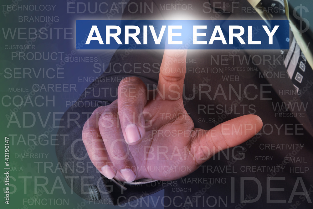 Businessman touching ARRIVE EARLY button on virtual screen Businessman touching ARRIVE EARLY button on virtual screen