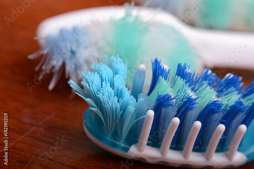 xtreme Macro close up of toothbrush with wooden background