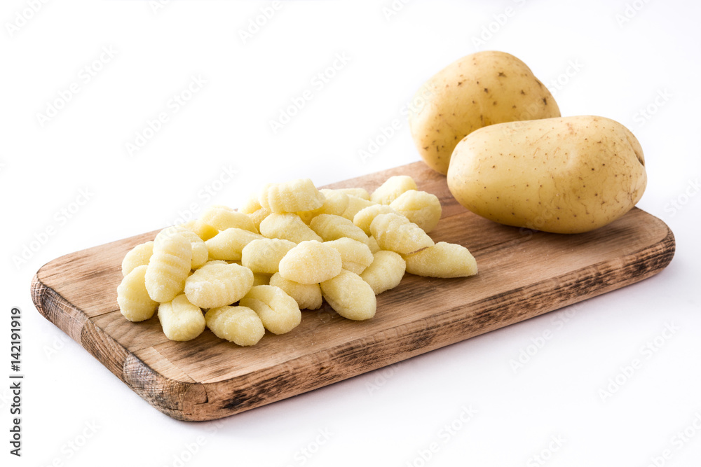 Fotografie Uncooked potato gnocchi isolated on white background