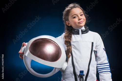 Little girl in space suit