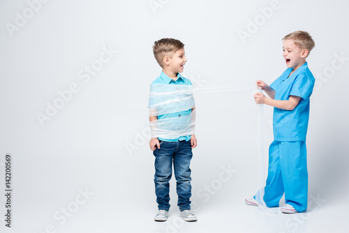 Kids playing doctor and patient