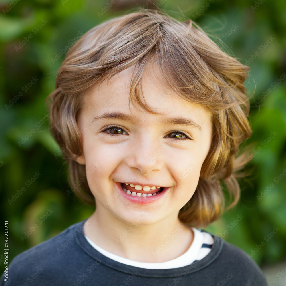 Adorable small child looking at camera Adorable small child looking at camera