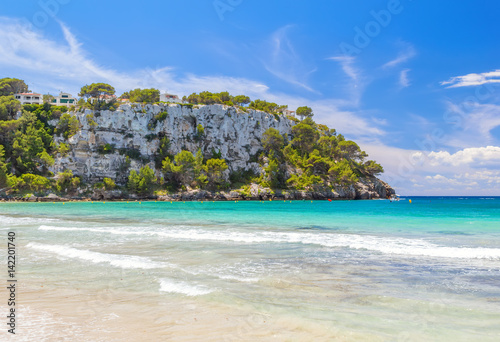 View on Mirador Sa Punta cliff from Cala Galdana beach at Menorca.