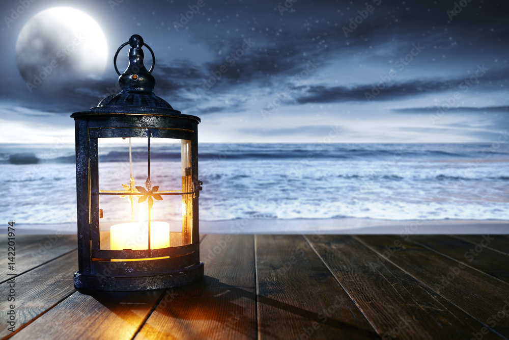lamp and sea at night 