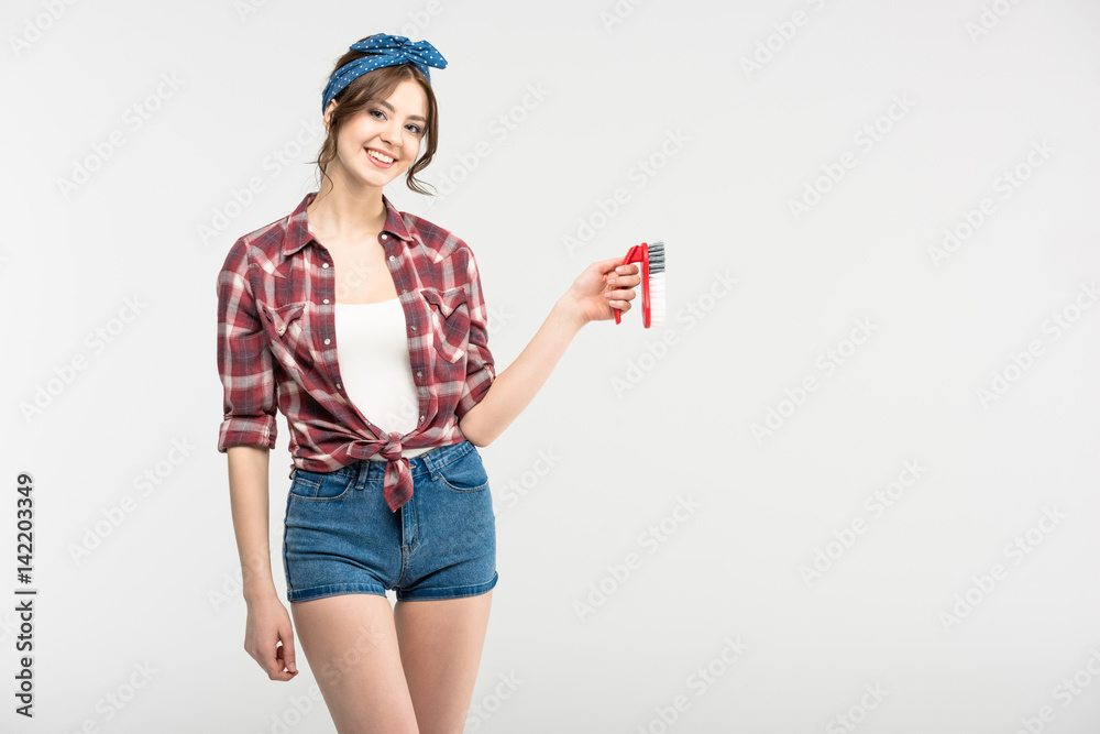 Woman with scrubbing brush