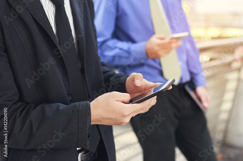 Businessman using mobile smart phone.Concept of business, technology, social media etc.