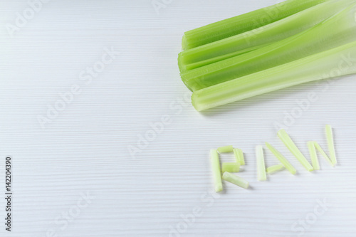 Raw celery stalks background 