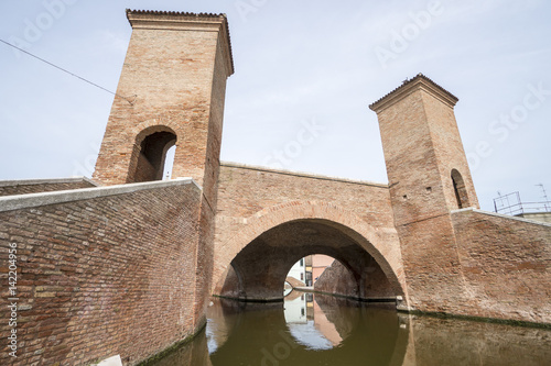 Comacchio, Ferrara, Italy: the ancient bridge Trepponti, a famous five-way bridge in the old town photo