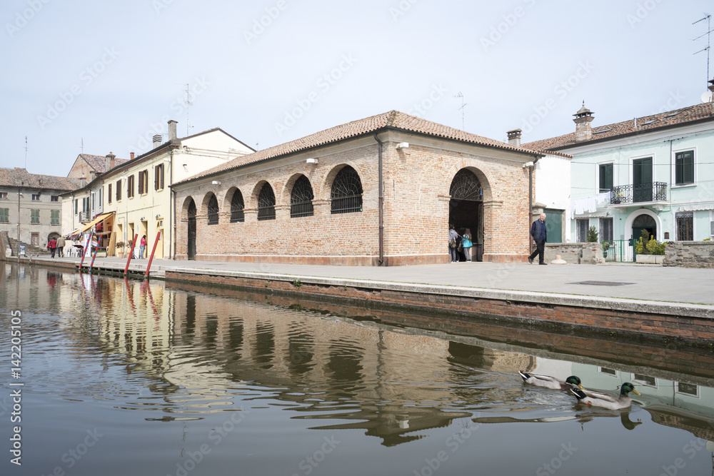 Comacchio, Ferrara, Italy: houses reflected in the canal