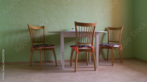 Dining table and three chairs
