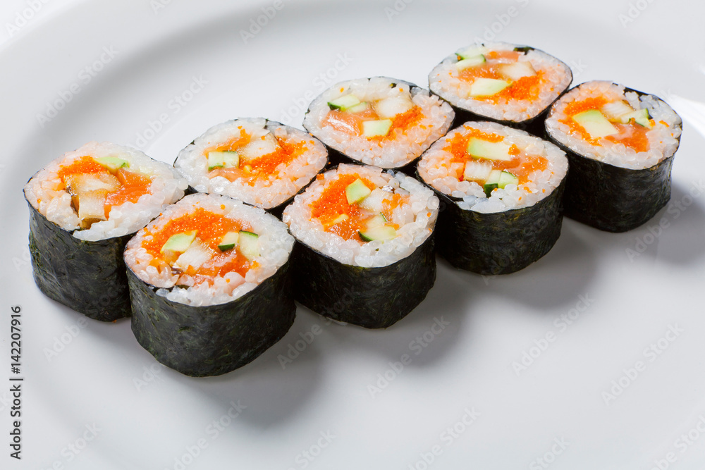 Rolls on the white plate. Japanese cuisine Rolls on the white plate. Japanese cuisine