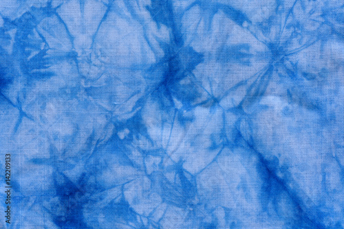  Pattern of blue dye on cotton cloth, Dyed indigo fabric background and textured