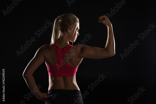 woman showing muscles