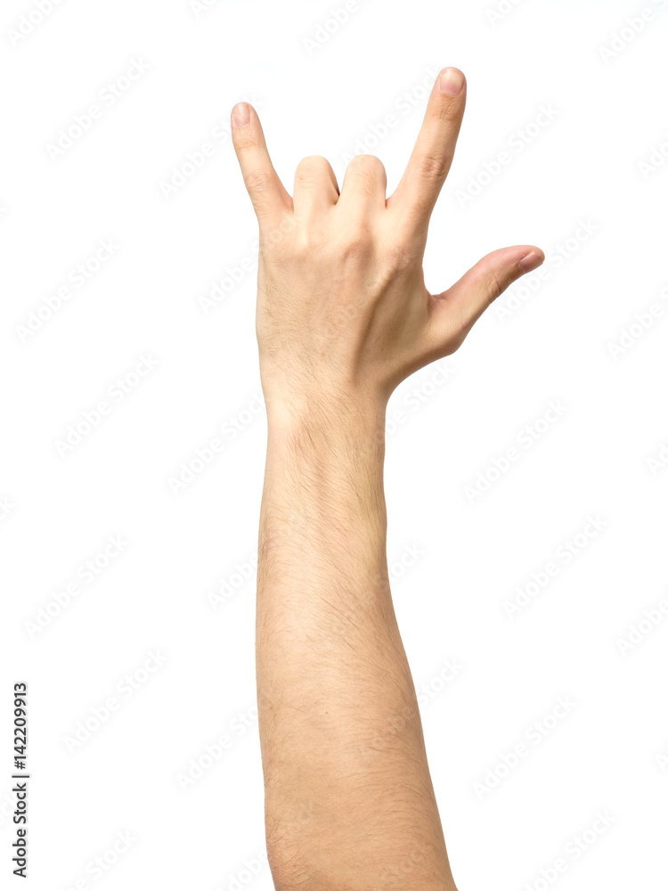 Hand giving the devil horns gesture Hand giving the devil horns gesture