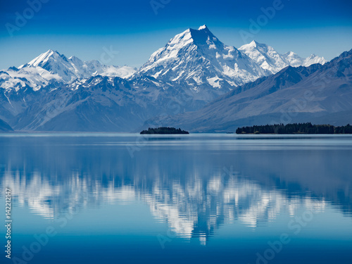 Mt. Hood reflection in calm lake, New Zealand © Christian Delbert
