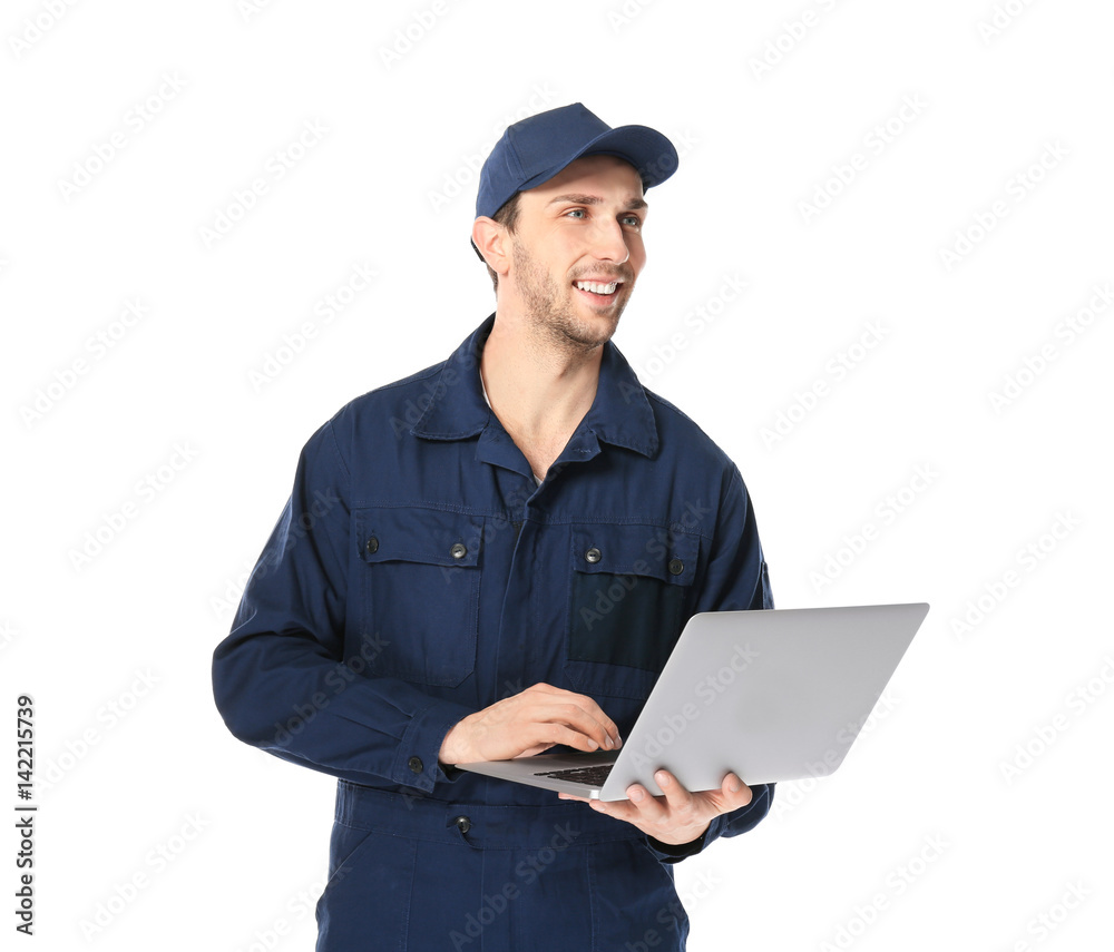 Handsome auto mechanic with laptop on white background Handsome auto mechanic with laptop on white background